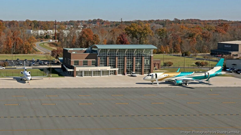 Aerial view of aircraft and facilities at Manassas Regional Airport